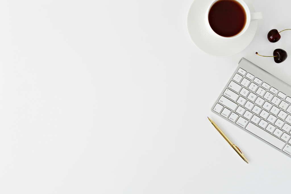A Keyboard Coffee And A Pen