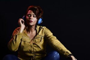 Black Lady With Headphones On Eyes Closed 1