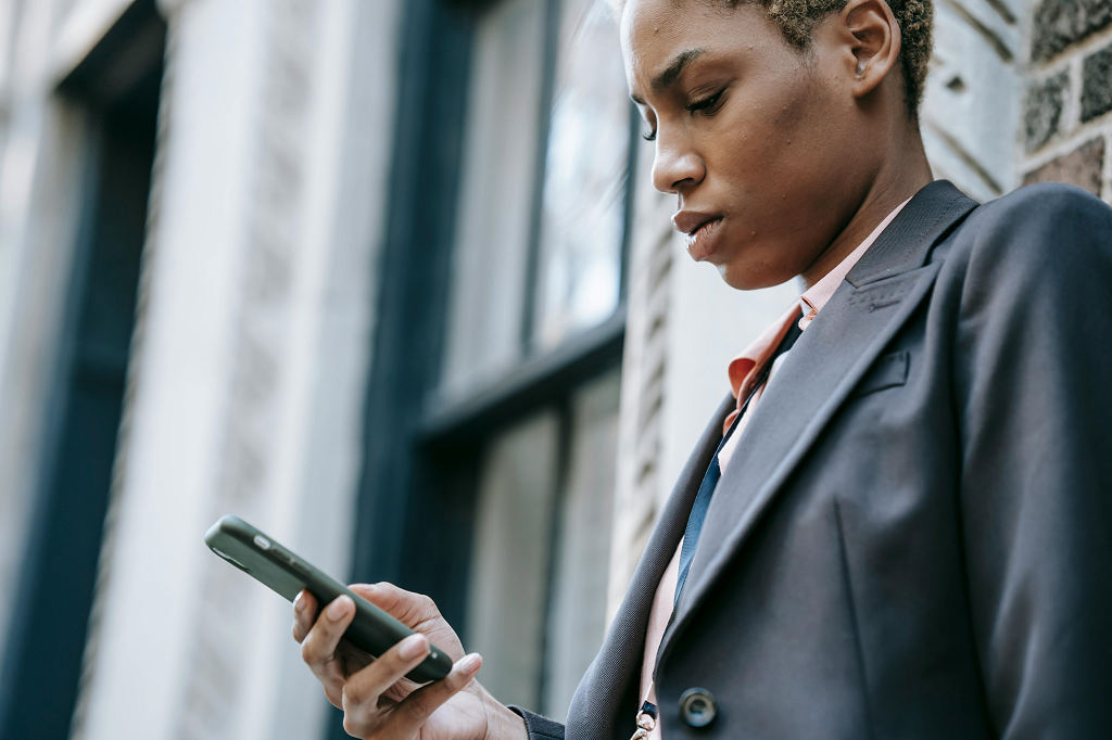 Black Lady Checking Her Phone