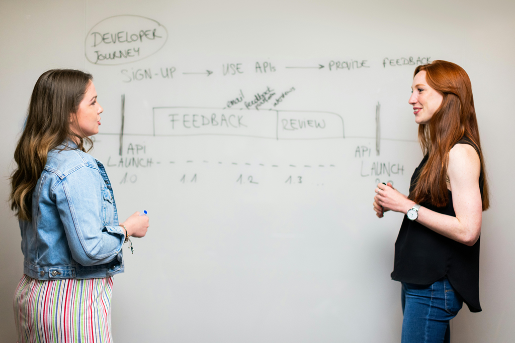 Two Ladies Discussing Customer Journey
