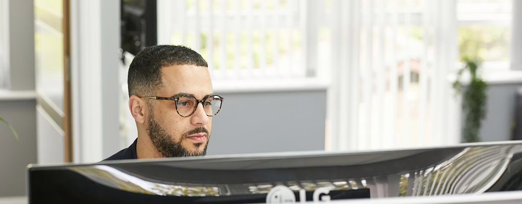 MWD A Man Working On His Computer
