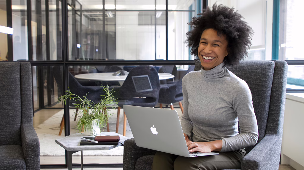Black Lady Smiling At Work