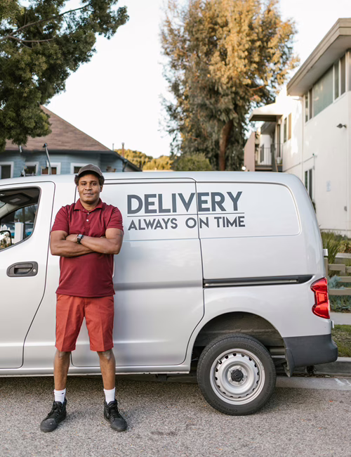 MWD - Delivery Man Standing Outside His Delivery Van